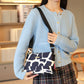 Damska torba crossbody z wieloma kieszeniami i nadrukiem