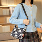 Damska torba crossbody z wieloma kieszeniami i nadrukiem
