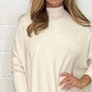 Damski sweter z nieregularnym golfem z dzianiny w stylu casual 3.86