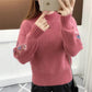 Gruby sweter z dzianiny z haftem kwiatowym