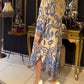 Luźna i elegancka sukienka z nadrukiem